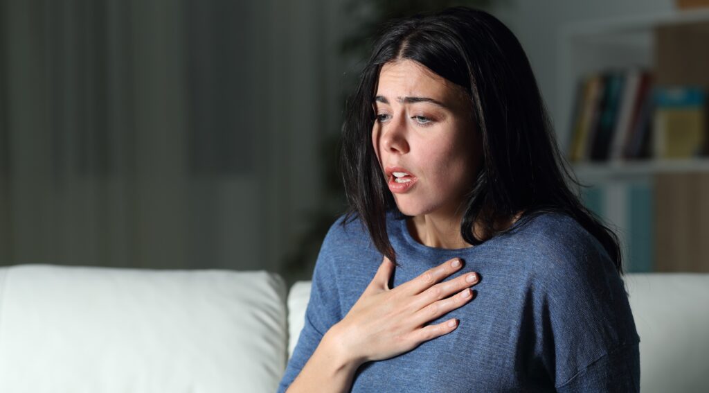 Woman experiencing severe asthma